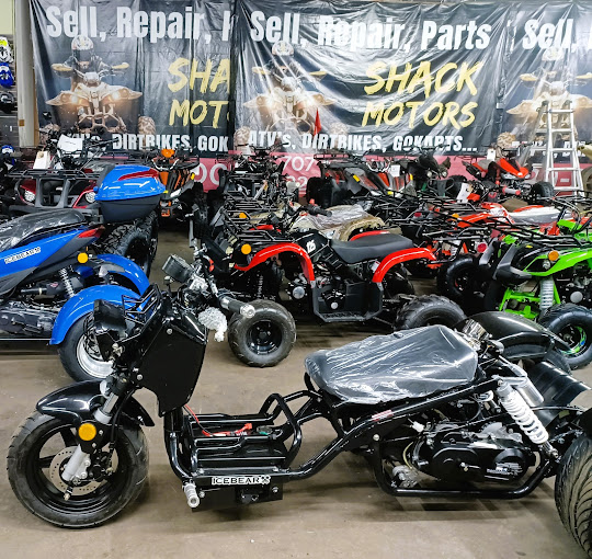 A group of motorcycles parked next to each other